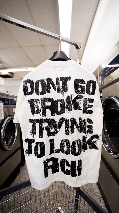 “Don’t Go Broke “ Oversized Graphic Tee - Premium  from Different Motion - Just $40! Shop now at Different Motion